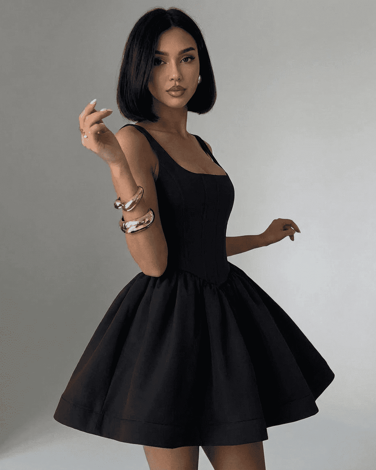 Elegant Xana Mini Dress by RAMBLION, featuring a square neck and playful silhouette, perfect for chic occasions.