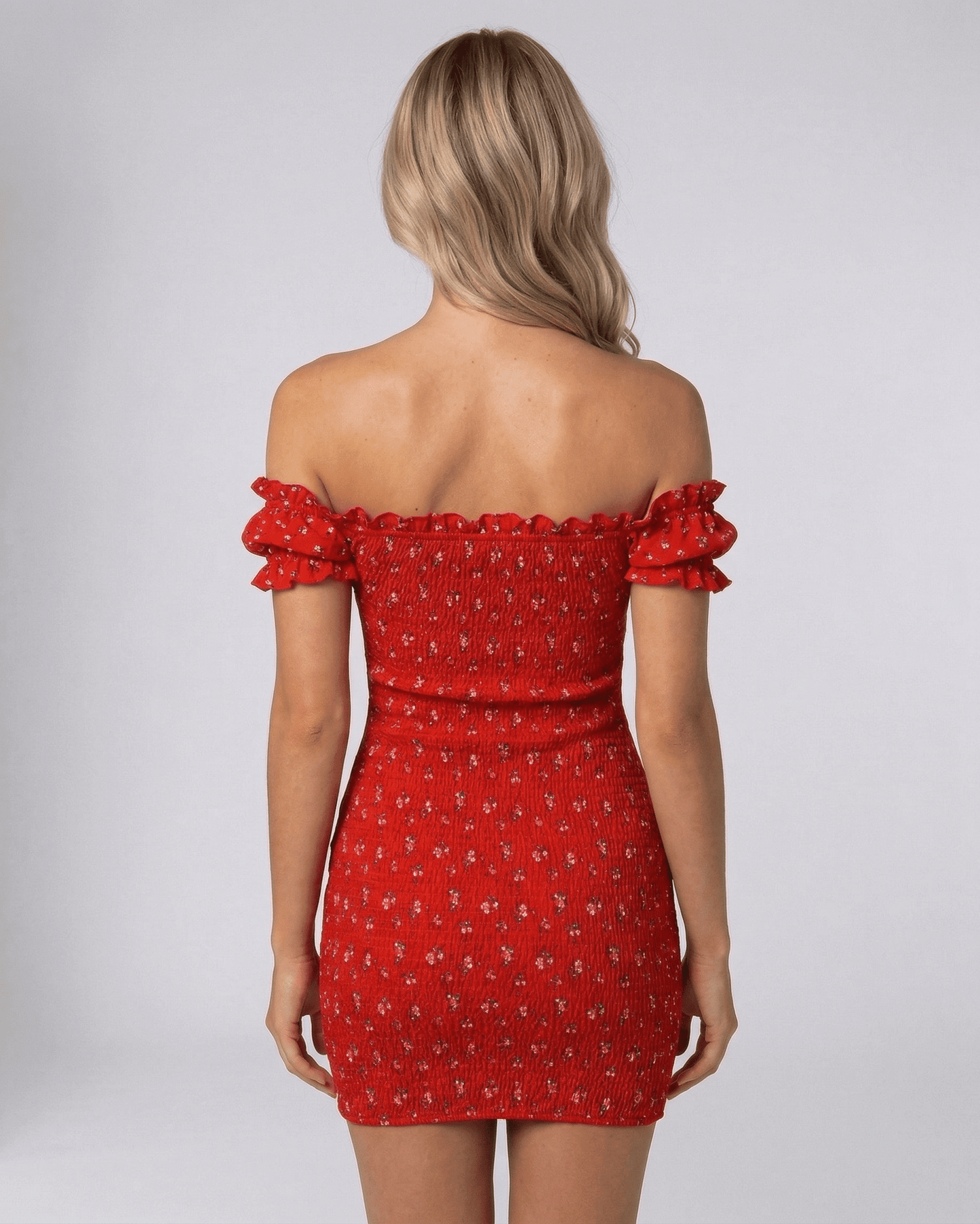 Rama Mini Dress back view, red off-shoulder with floral pattern, lightweight satin fabric, perfect for elegant occasions by RAMBLION.