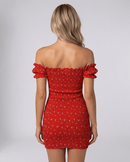 Rama Mini Dress back view, red off-shoulder with floral pattern, lightweight satin fabric, perfect for elegant occasions by RAMBLION.