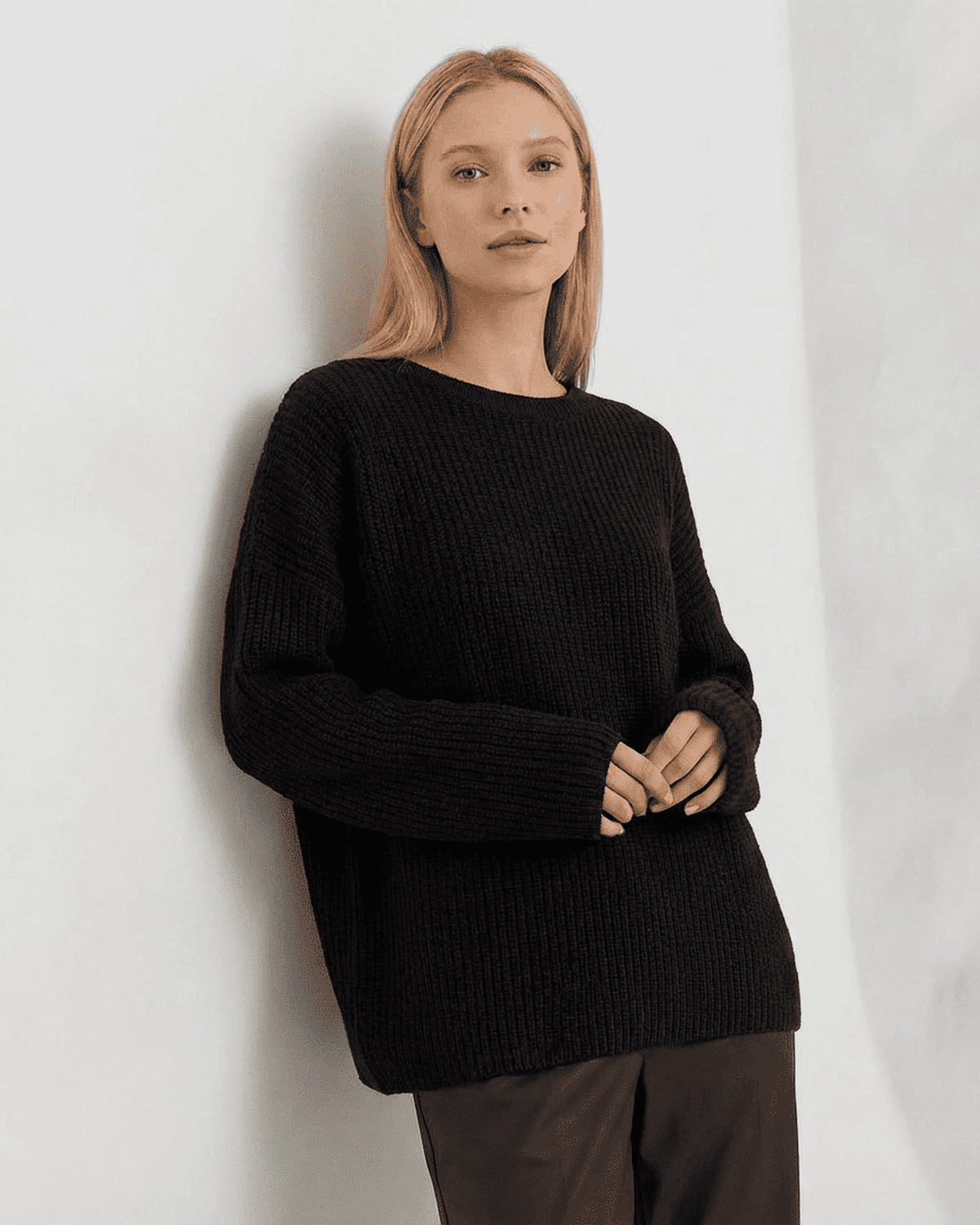 Arden Sweater in black, loose fit ribbed knitwear with long sleeves and round neck by RAMBLION.