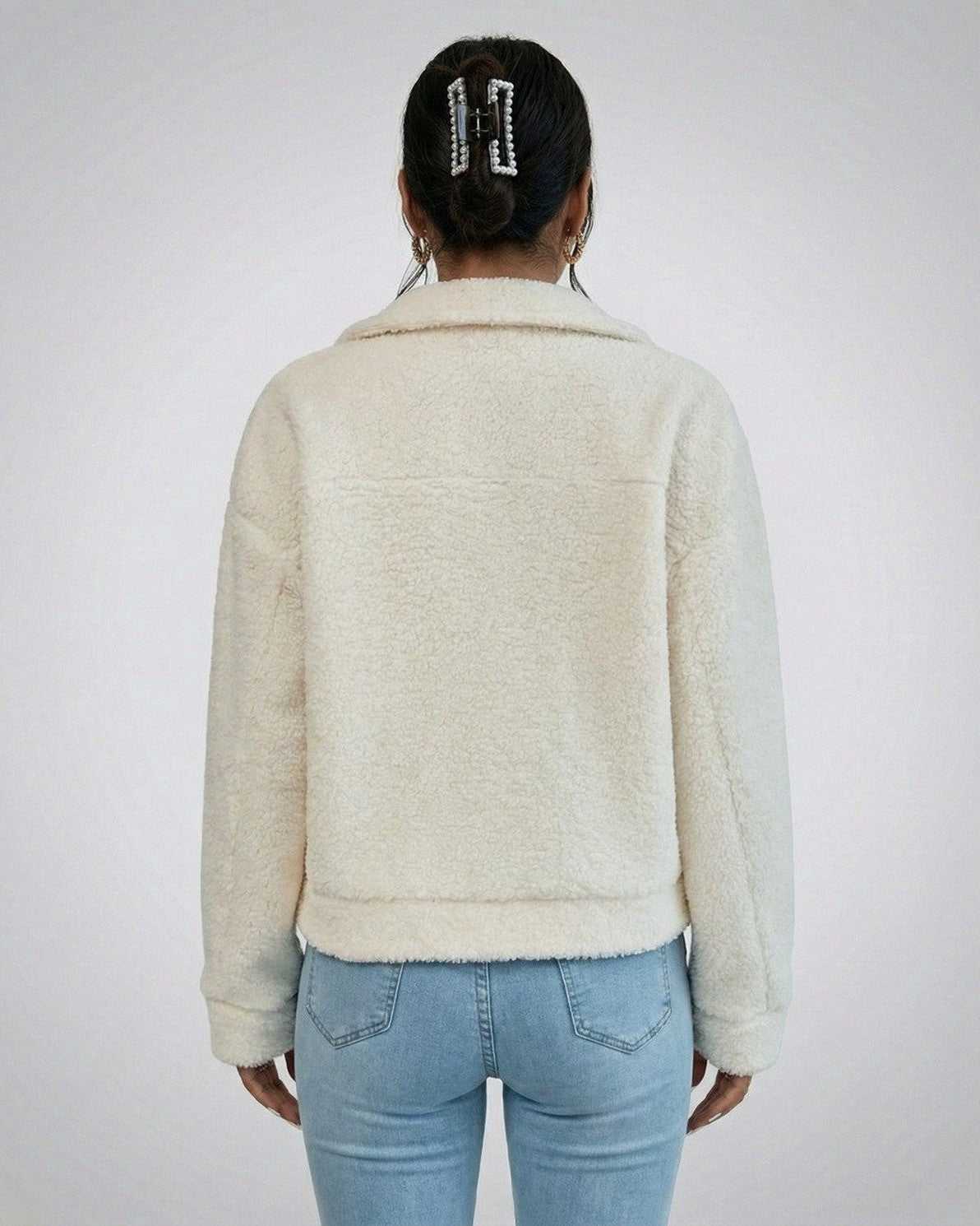 Back view of the RAMBLION Aspen Jacket – Women’s Faux Fur Jacket with Lapel Collar in cream color.