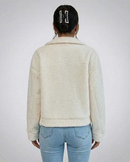 Back view of the RAMBLION Aspen Jacket – Women’s Faux Fur Jacket with Lapel Collar in cream color.