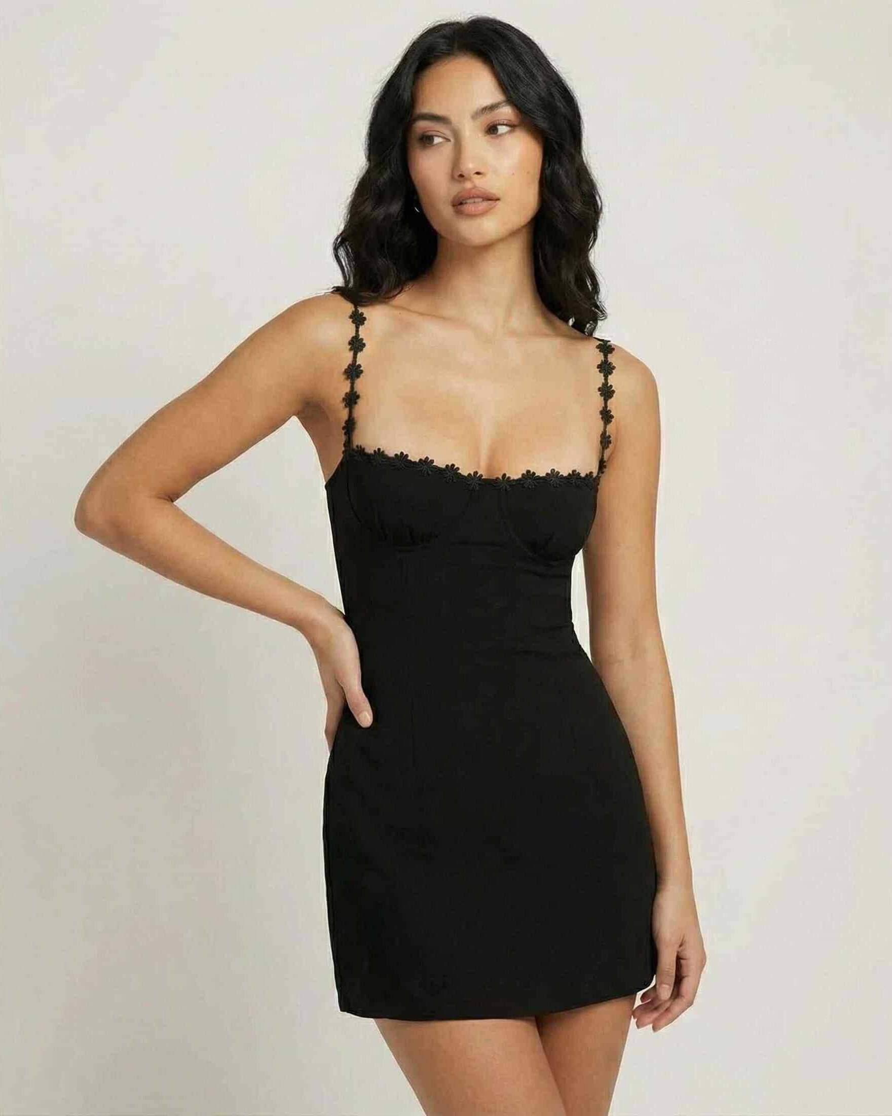 Neoprene Mini Dress by RAMBLION, black mini dress with square neck, spaghetti straps, floral trim, perfect for elegant evenings.