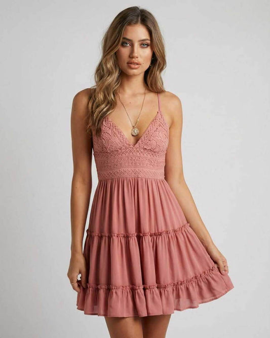 Blossom Mini Dress in pink with lace spaghetti straps and a flattering silhouette for feminine style.