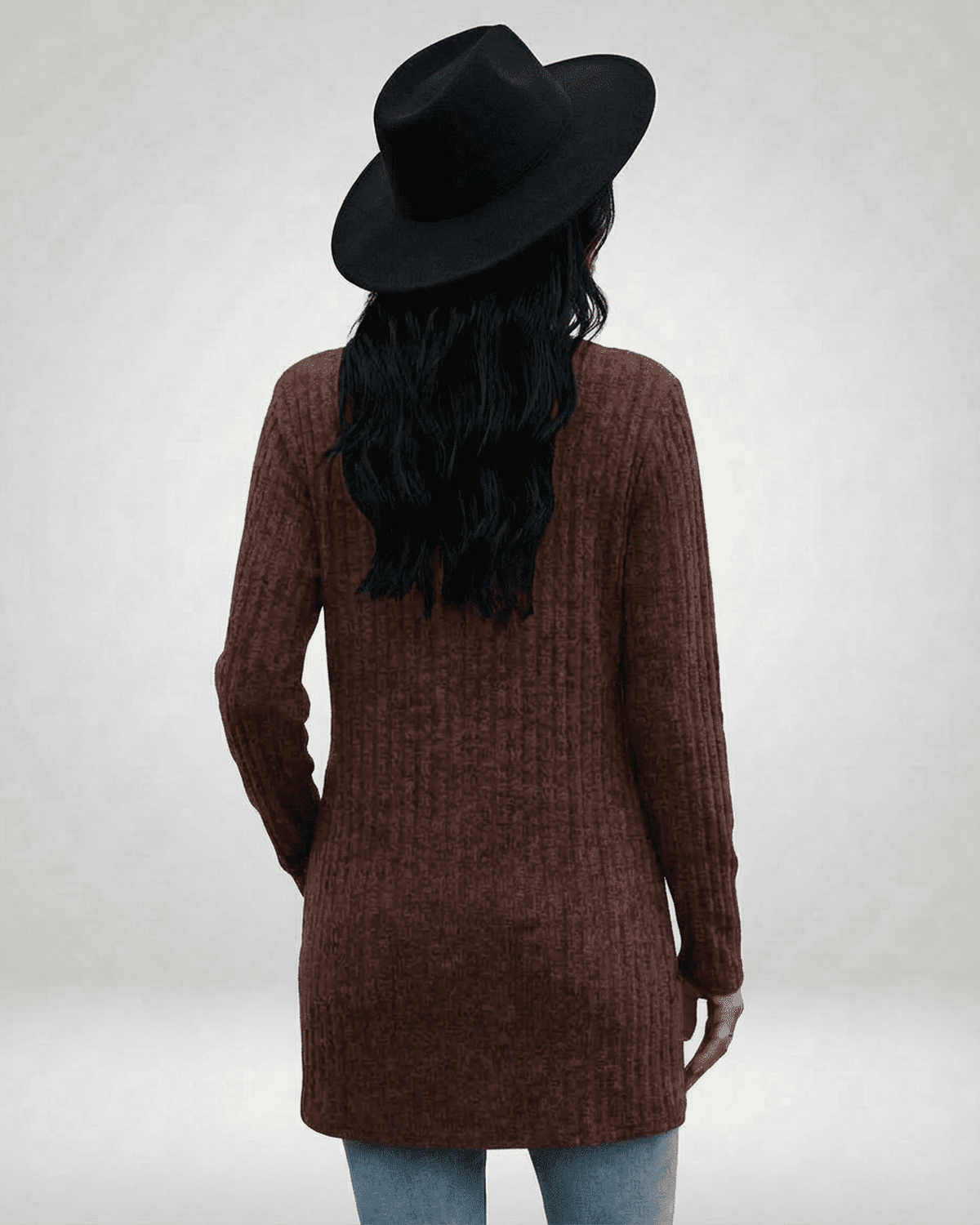 Cairo Cardigan in brown, longline knitwear for women, styled with a wide-brim hat, showcasing the back view.