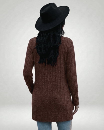 Cairo Cardigan in brown, longline knitwear for women, styled with a wide-brim hat, showcasing the back view.