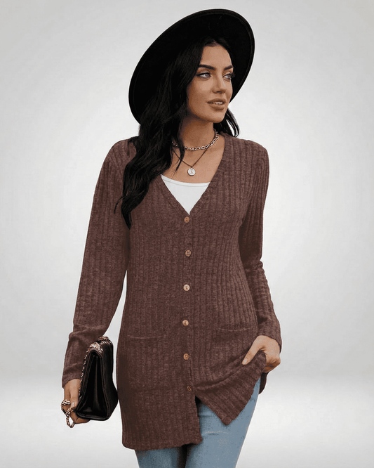 Cairo Cardigan — Longline button-front knitwear in brown, styled with a hat and jeans, perfect for everyday elegance.