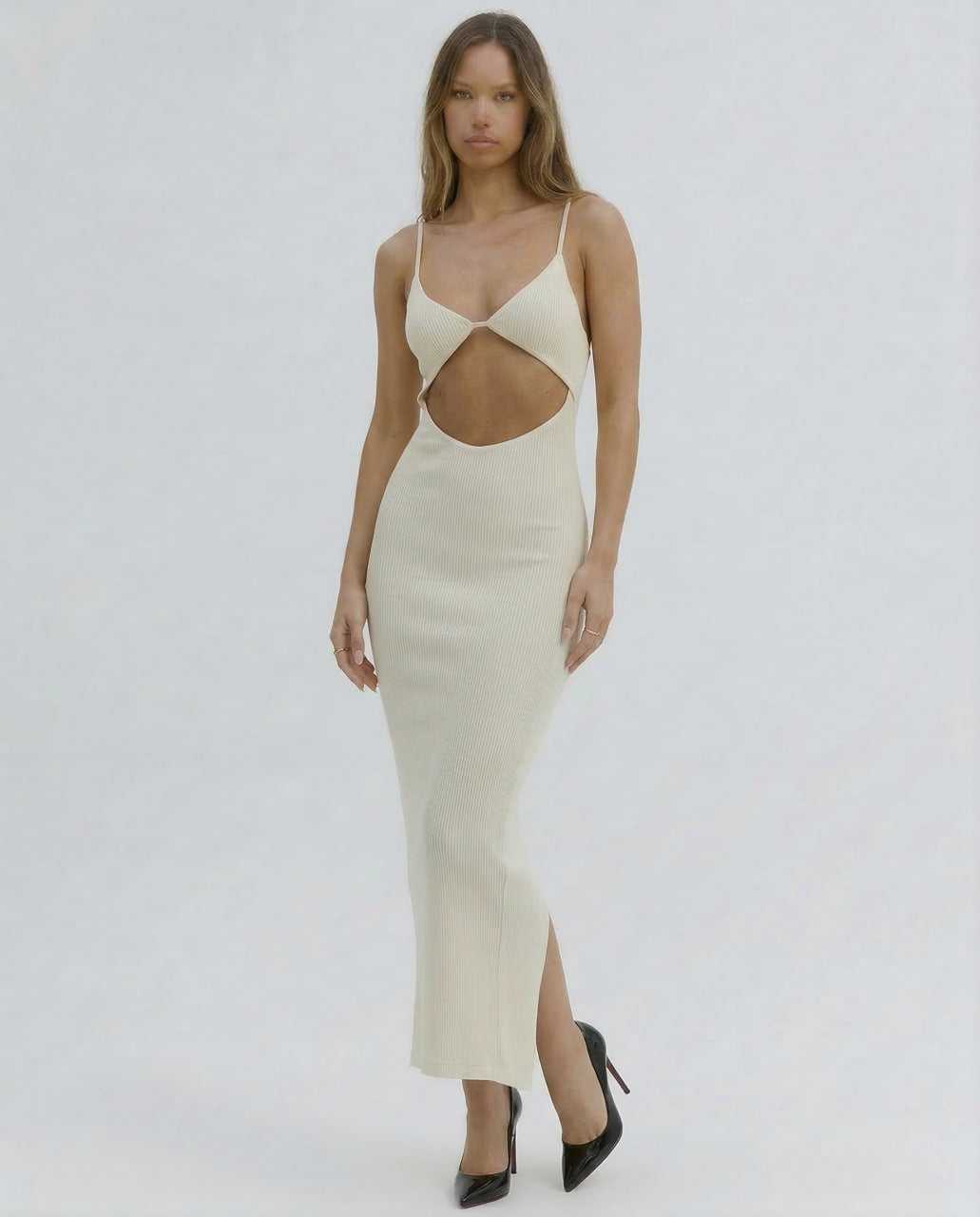 Xeva Midi Dress in cream with cutout detail, perfect for summer evenings, by RAMBLION.