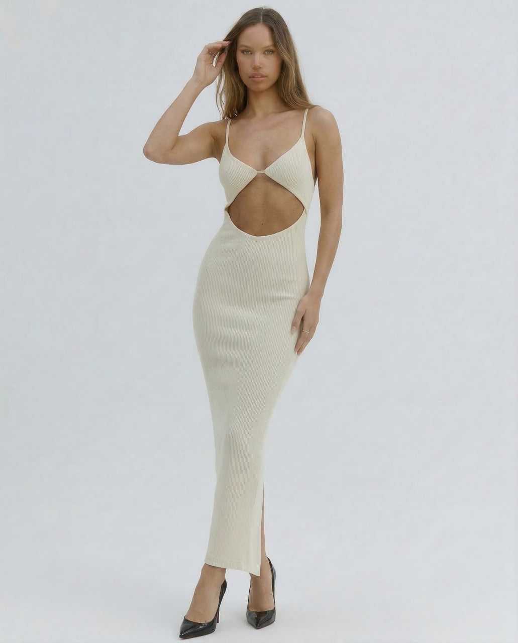 Xeva Midi Dress showcasing a chic cut-out design, perfect for summer parties and elegant events by RAMBLION.