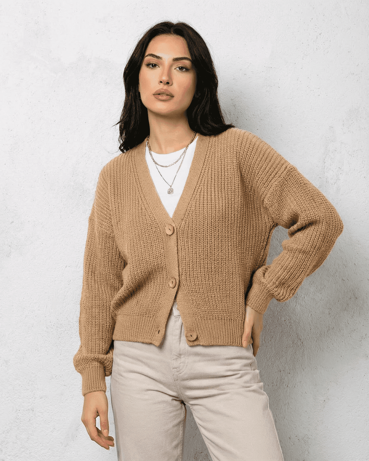 Saffron Cardigan by RAMBLION, elegant beige knitwear with relaxed V-neck, perfect for layering and comfort.