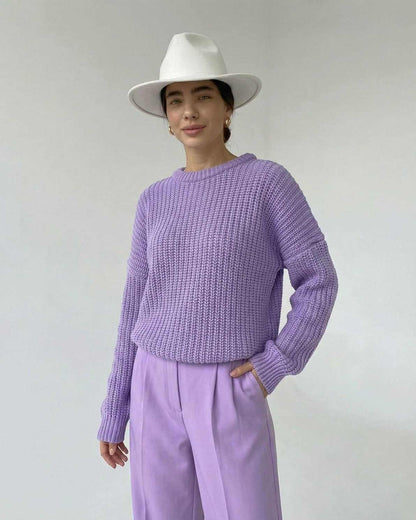 Lavande Sweater by RAMBLION, textured knit, relaxed casual fit, worn with purple pants and a white hat.