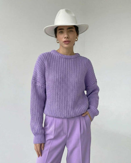 Lavande Sweater by RAMBLION in textured knit, featuring a relaxed fit and styled with a hat and pastel pants.
