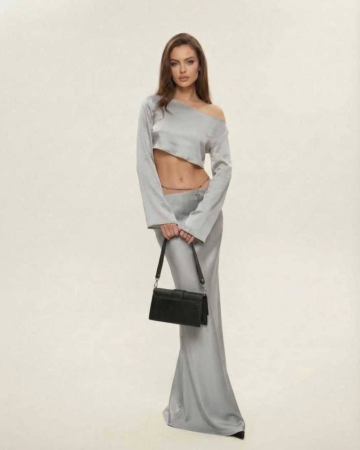 Lexa Midi Dress in luxurious grey satin, featuring a stylish slash neckline, perfect for evening wear. By RAMBLION.