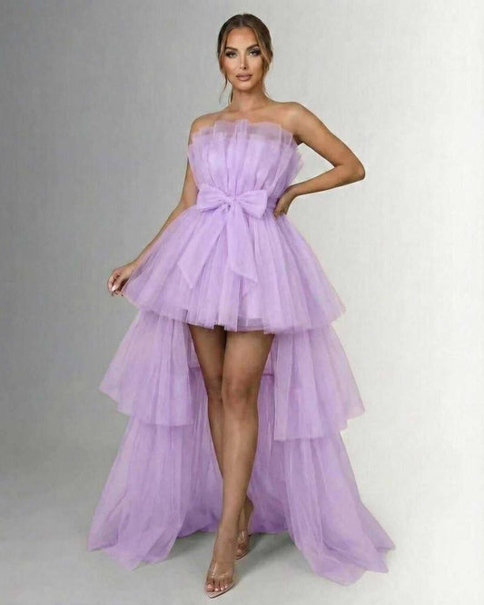 Lilacina Maxi Dress – Strapless tulle high-low gown with bow detail, featuring soft lilac layers and elegant silhouette.