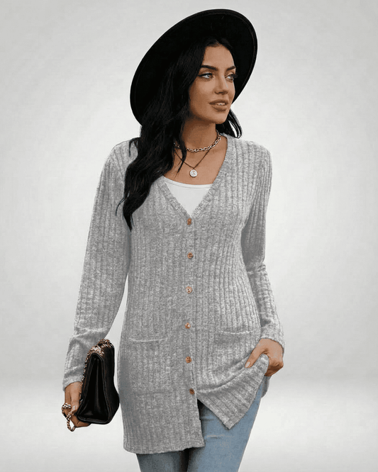 Luna Cardigan - Longline button-front knitwear featuring a ribbed texture, V-neckline, and long sleeves.
