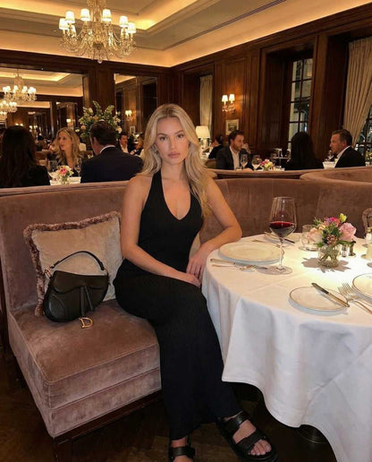 Numa Maxi Dress in black, elegant V-neck design, perfect for a sophisticated evening out by RAMBLION.