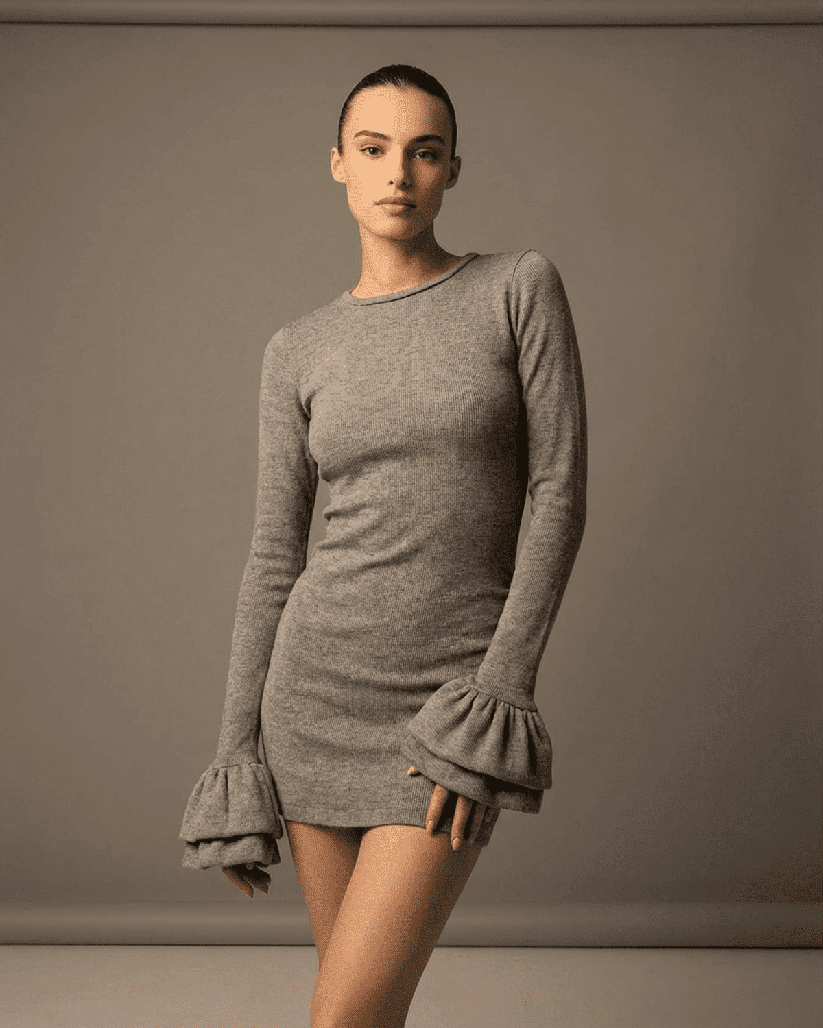 Luna Mini Dress – Elegant ruffled sleeve bodycon dress in grey by RAMBLION, featuring a sleek crew neck and stylish design.
