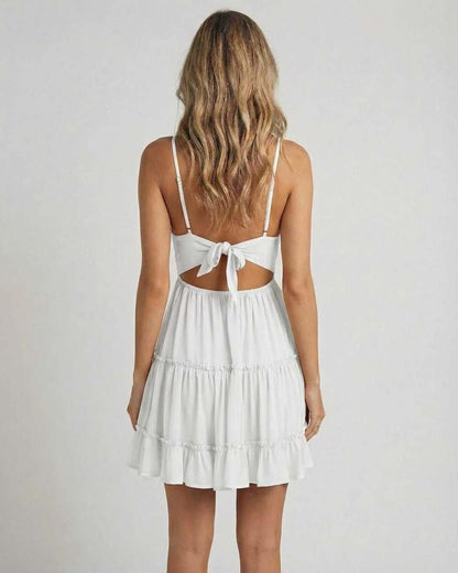 Back view of the Luna Mini Dress by RAMBLION with lace bodice and flowy tiered skirt.