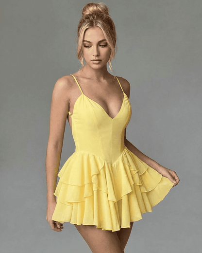 Marigold Mini Dress in vibrant yellow with V-neck and ruffle skirt by RAMBLION.