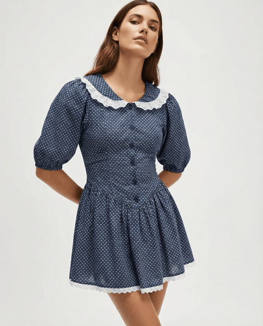Marinette Mini Dress with Peter Pan Collar and Puff Sleeves in navy blue polka dots by RAMBLION.