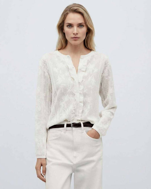 Monaco Blouse by RAMBLION – Elegant long sleeve white knit blouse with jacquard texture for modern minimalism.