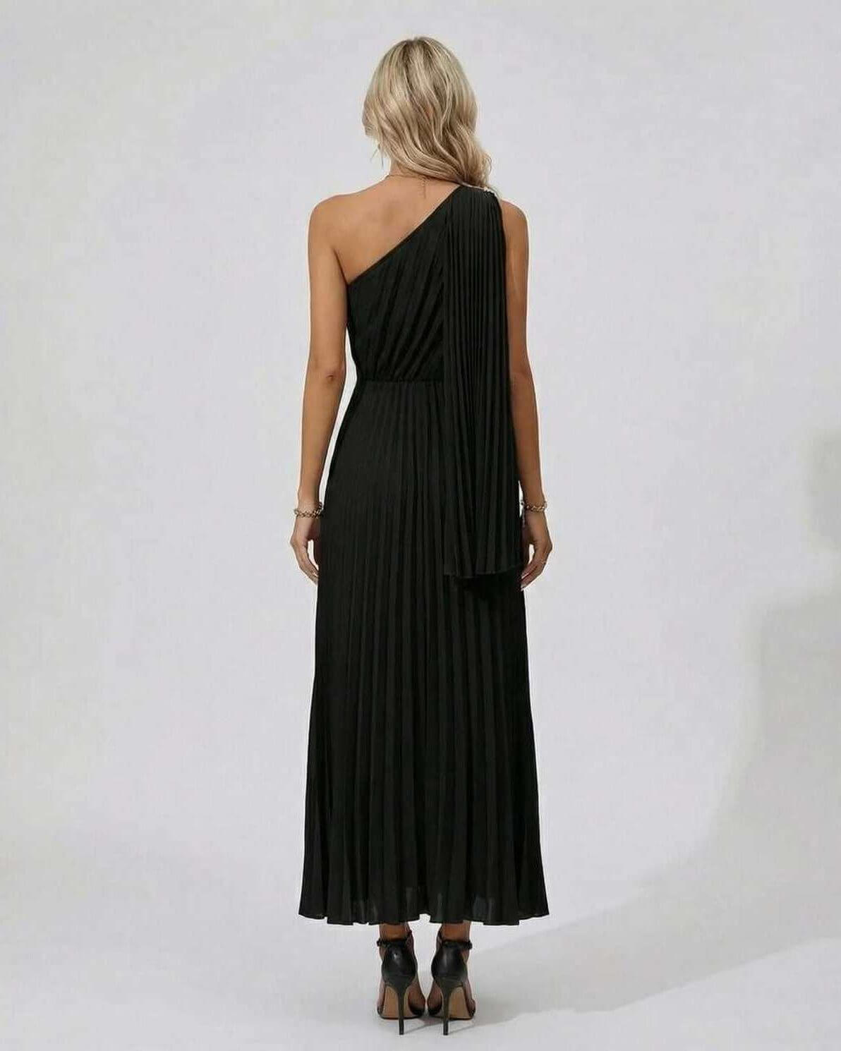 Back view of the Nova Midi Dress by RAMBLION with elegant one-shoulder design and pleated hem.
