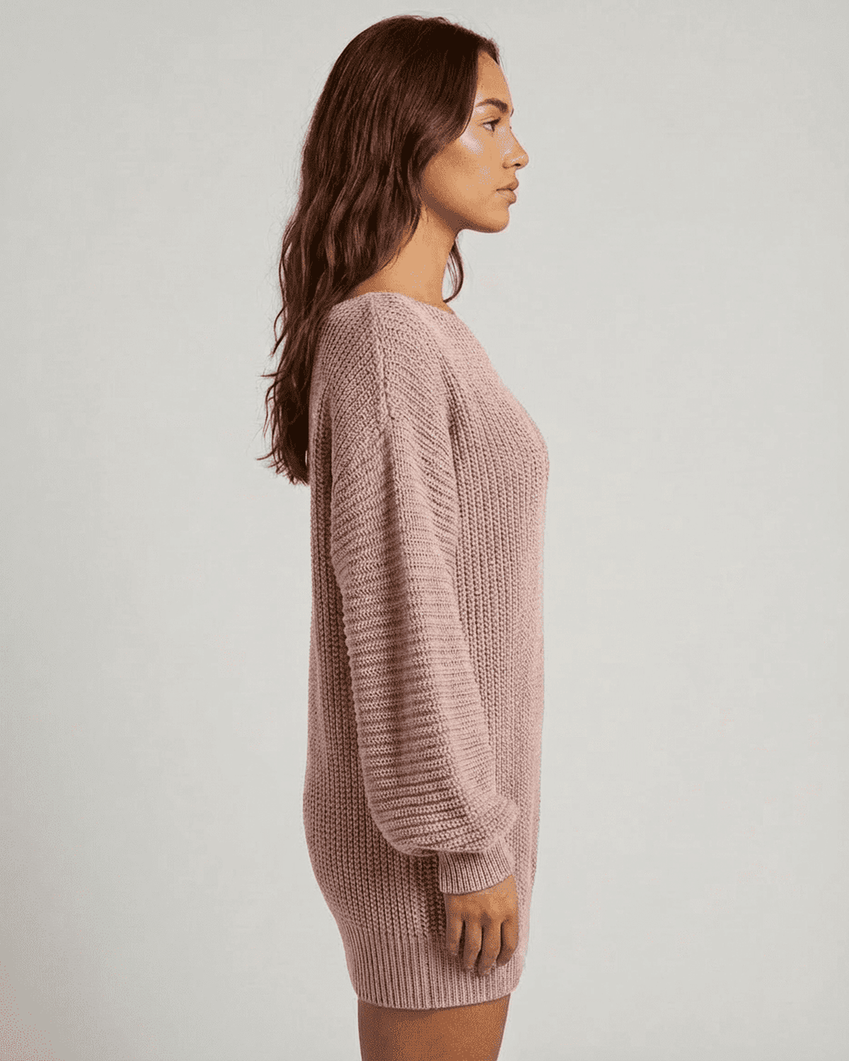 Nova Mini Dress side view featuring soft pink ribbed knit fabric and long lantern sleeves by RAMBLION.