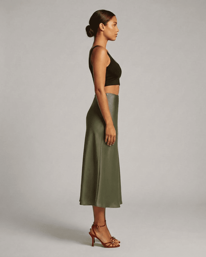 Olivia Midi Skirt in olive green, side view, showcasing elegant satin mermaid design by RAMBLION.