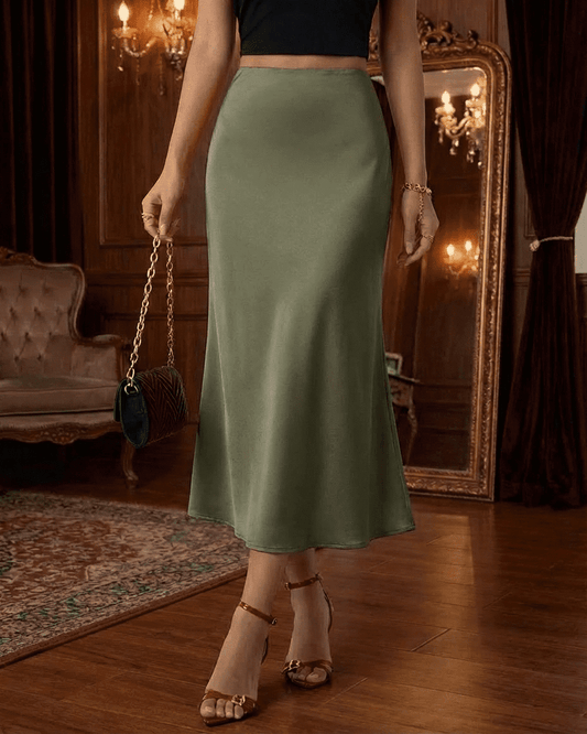 Olivia Midi Skirt – Satin mermaid midi skirt in olive green, showcasing elegance and a flattering silhouette.