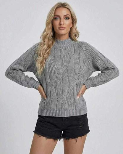 Orion Sweater in grey, featuring cable-knit design and ribbed detailing for stylish fall and winter wear.