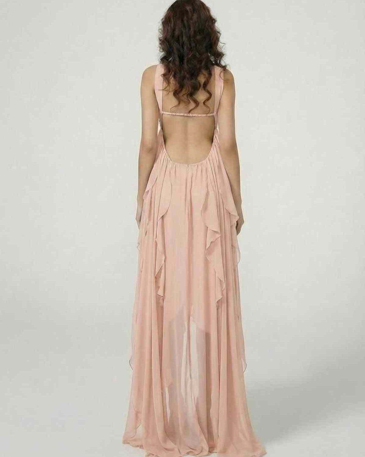 Back view of the Peachira Maxi Dress by RAMBLION featuring cascading ruffles and a strapless design.