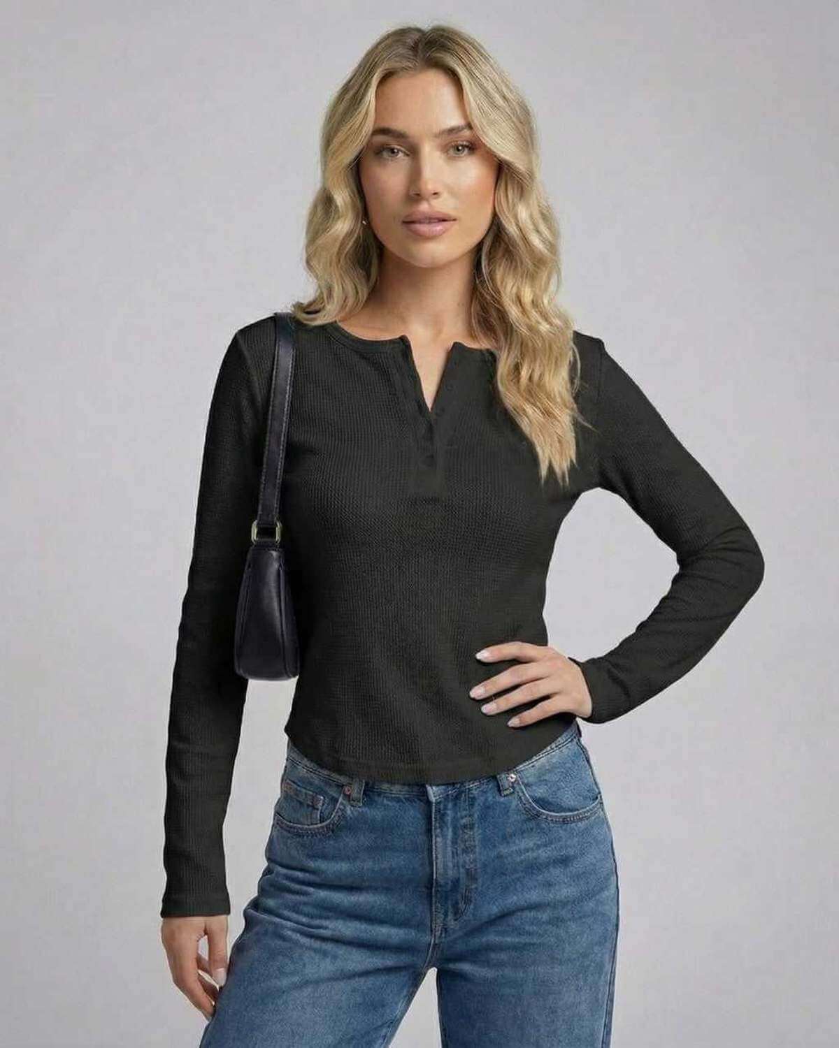 Positano Top black long sleeve top by RAMBLION featuring textured waffle knit, stylish comfort for various occasions.