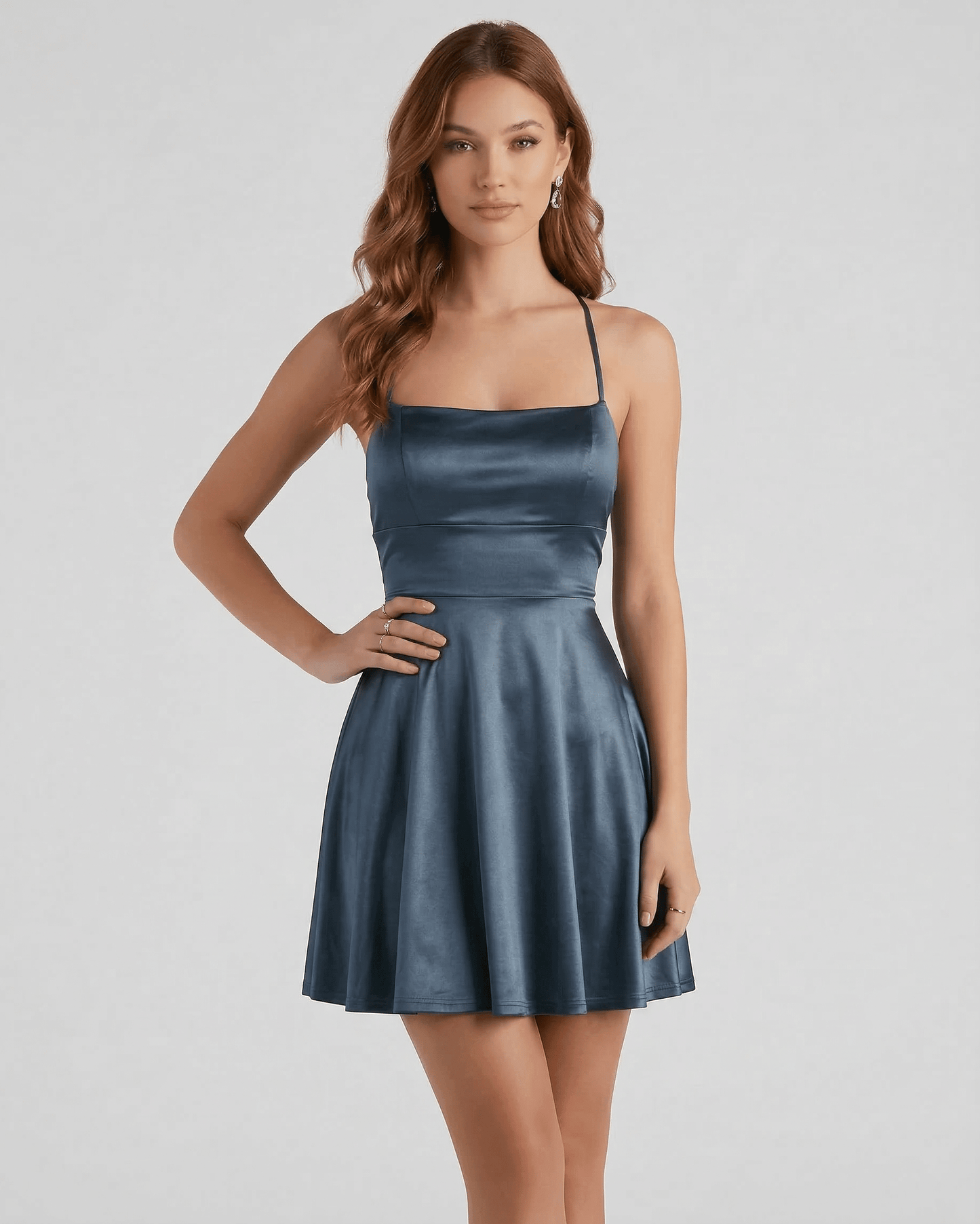 Roa Mini Dress by RAMBLION in deep blue satin, structured bodice, flared skirt for evening parties, modern elegance.