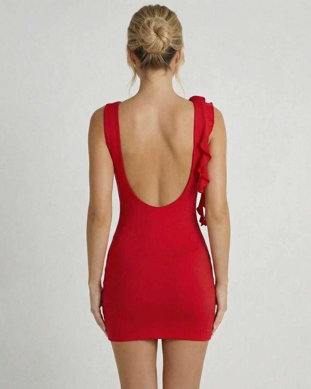 Ruby Mini Dress - Bold red sleeveless bodycon with ruffle detail, showcasing a flattering fit and elegant silhouette.