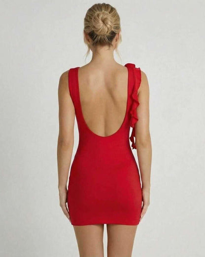 Ruby Mini Dress - Bold red sleeveless bodycon with ruffle detail, showcasing a flattering fit and elegant silhouette.