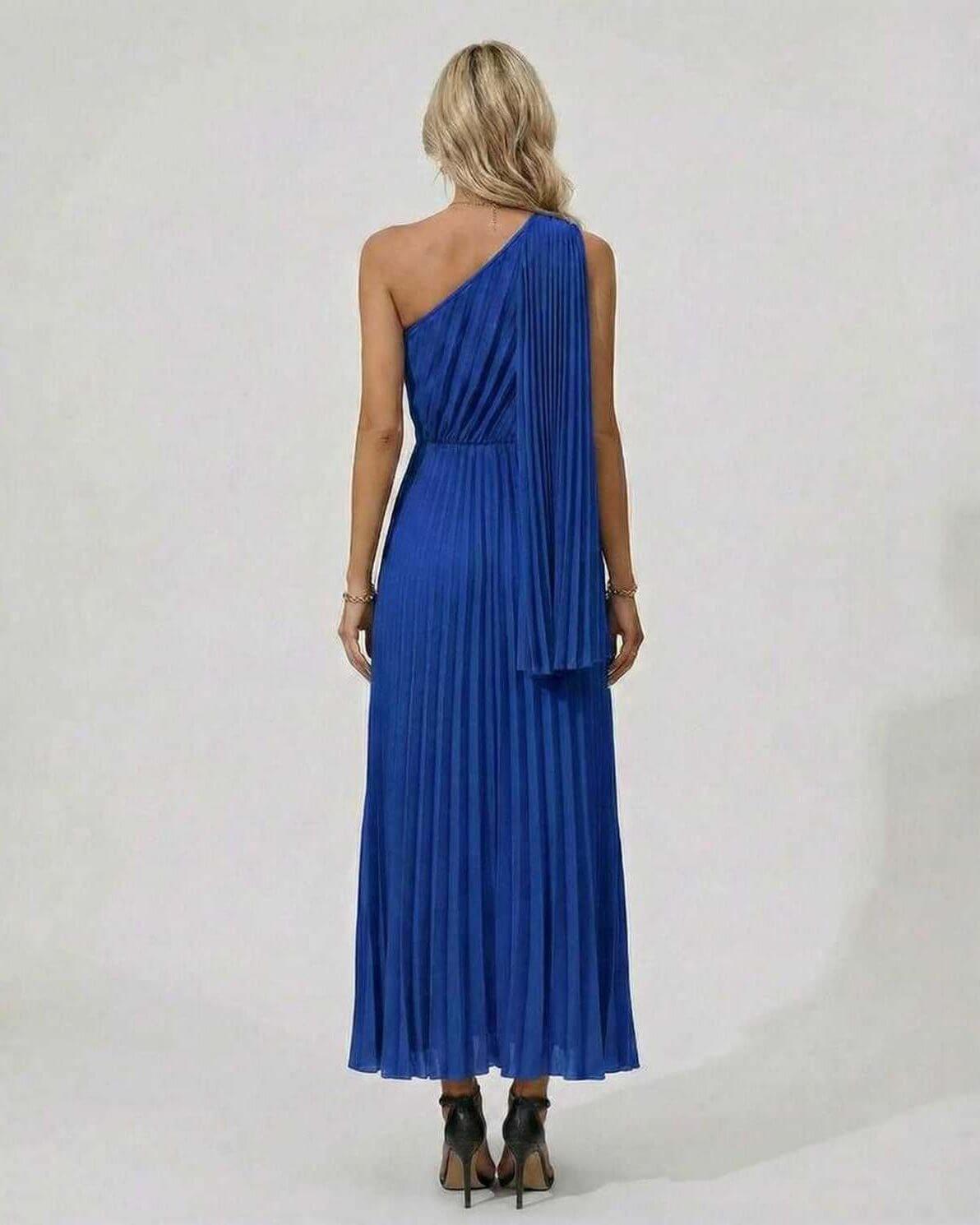 Back view of the Sapphire Midi Dress in blue with one shoulder and pleated hem, perfect for elegant evening wear.