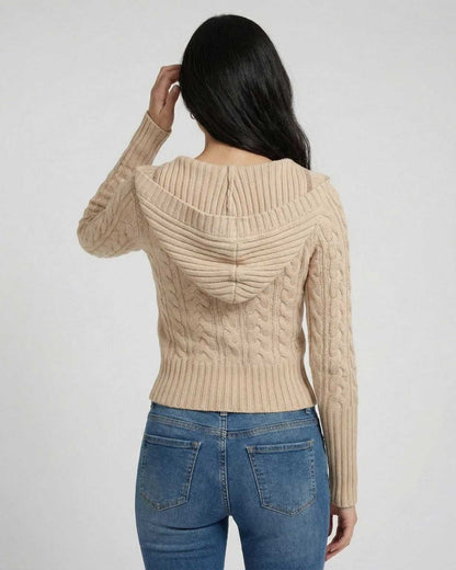 Back view of the Siena Sweater by RAMBLION, a hooded cable knit slim fit sweater in a beige color.