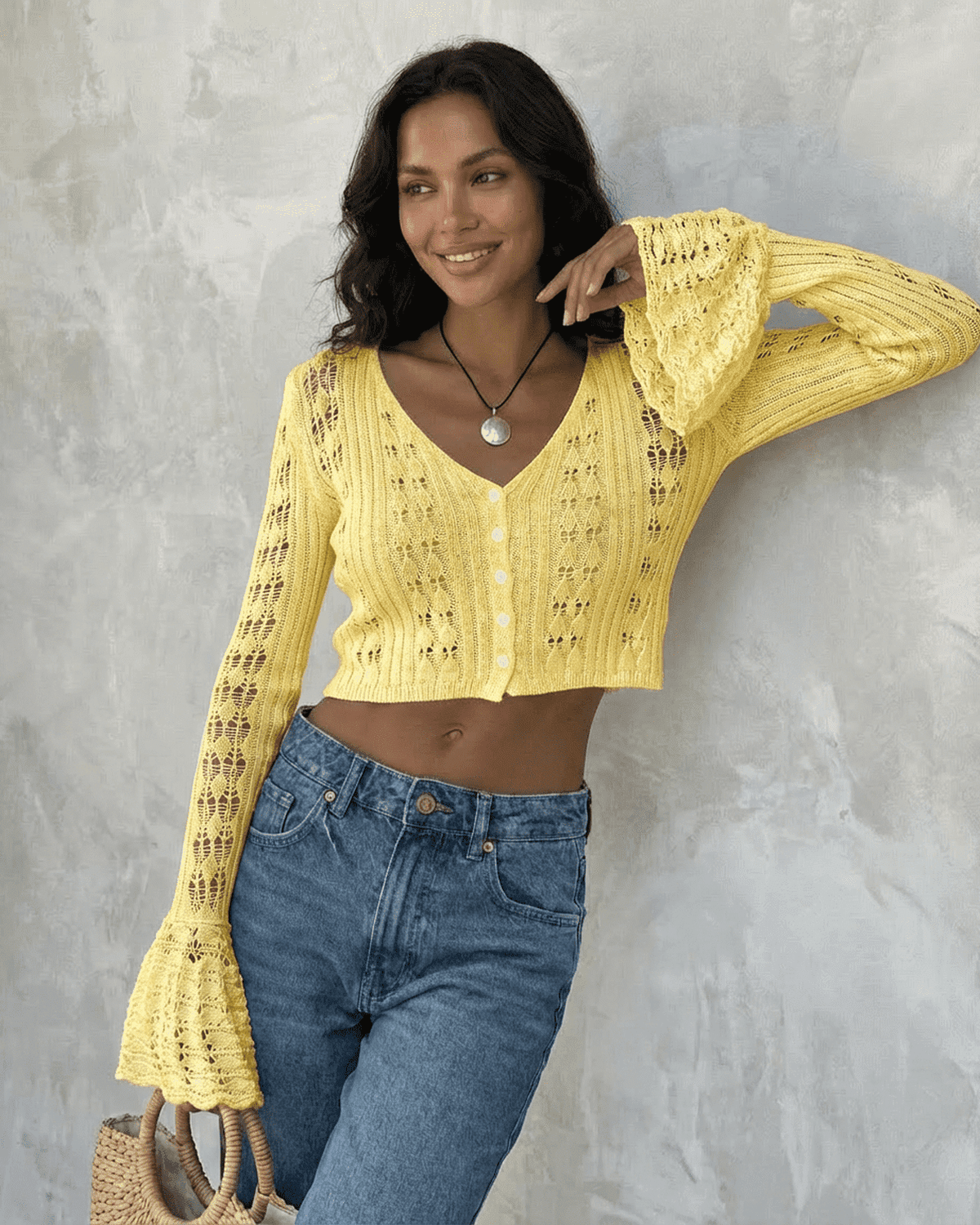 Solana Cardigan by RAMBLION in yellow, cropped cotton knit with flare sleeves, perfect for warm-weather styling.