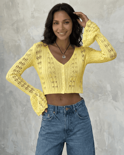 Solana Cardigan in yellow, cropped cotton knit with flare sleeves, perfect for layering and everyday styling by RAMBLION.