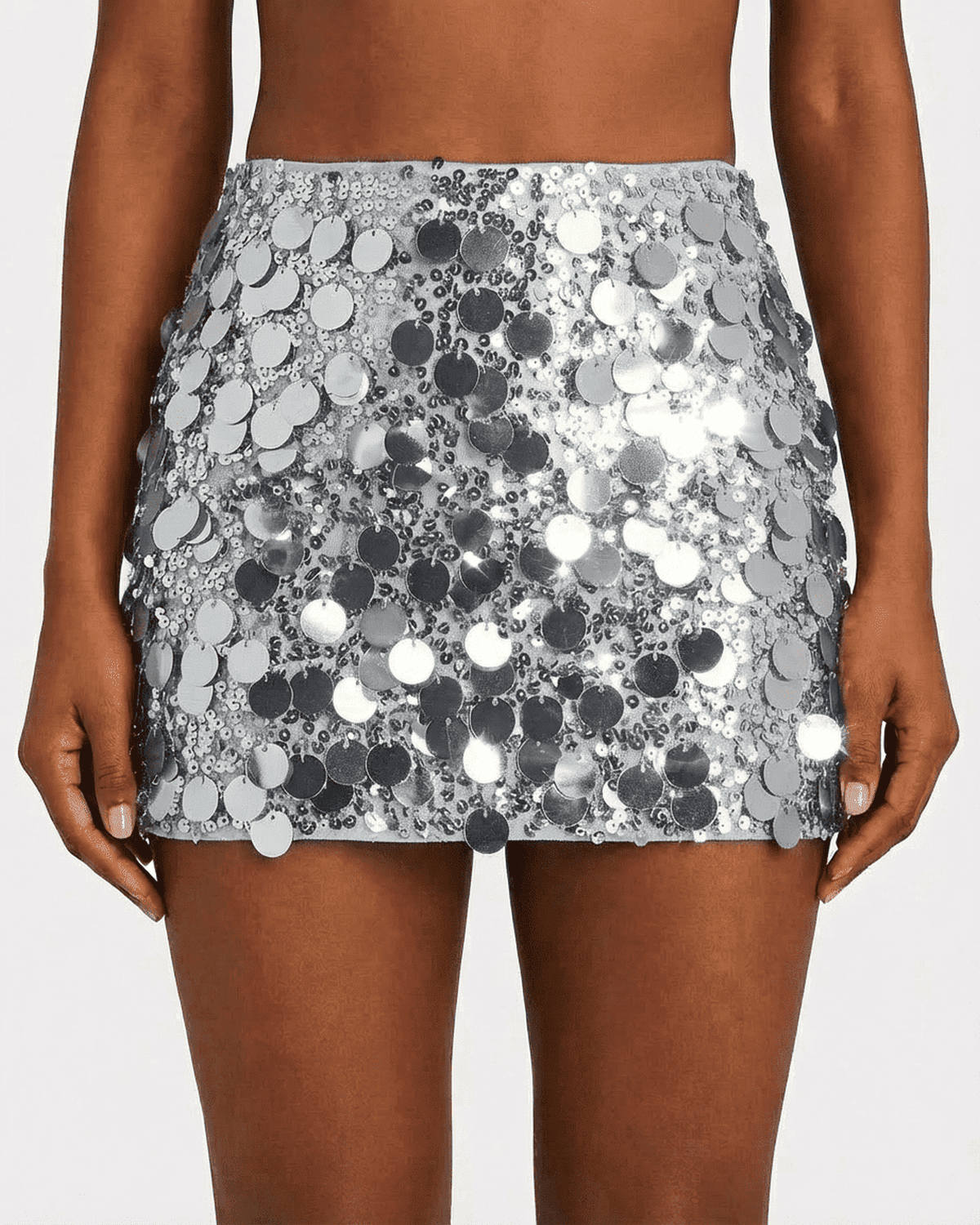 Sterling Mini Skirt showcasing silver sequin details, perfect for parties and night-out styling by RAMBLION.