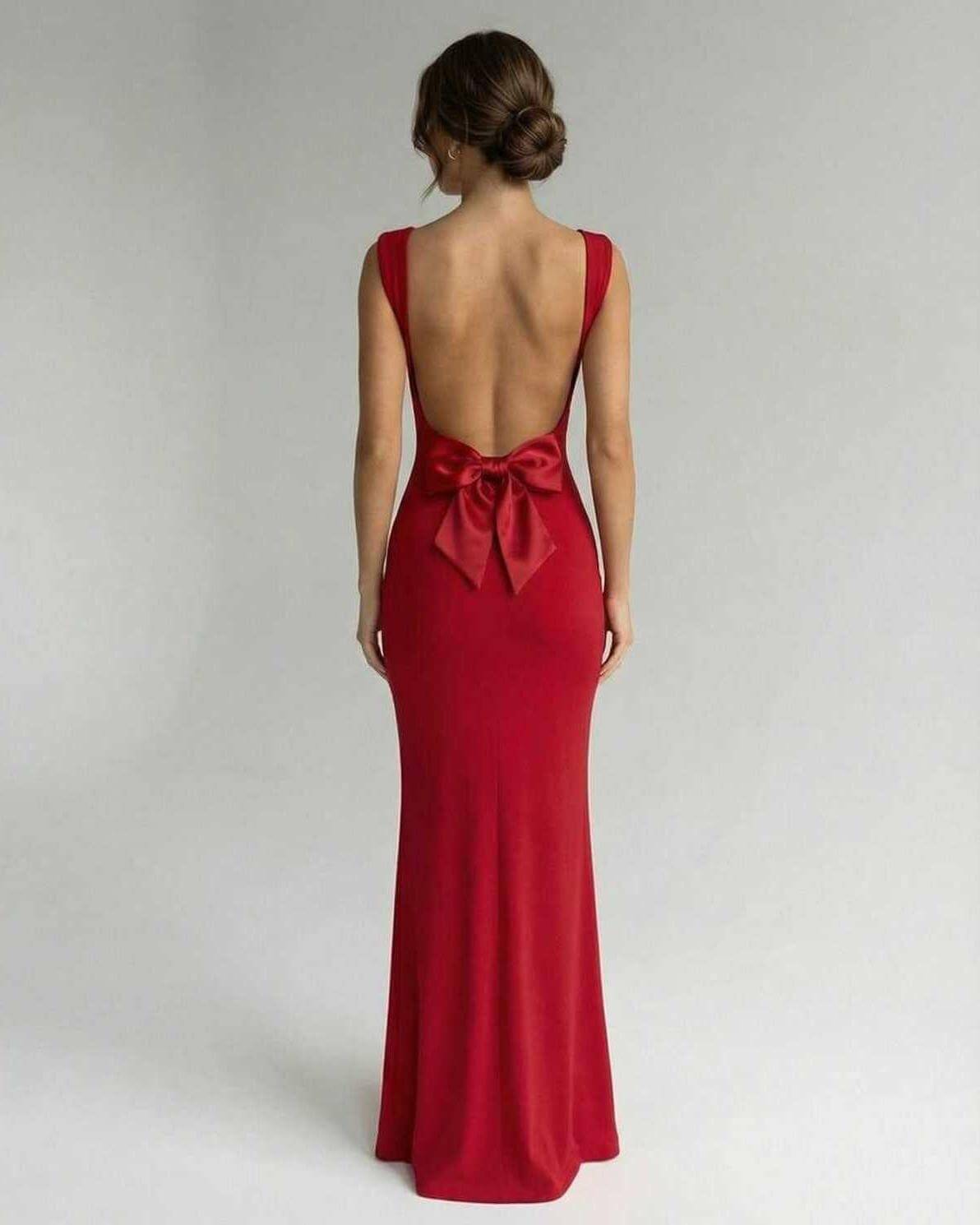 Toya Maxi Dress in vibrant red, backless design with bow detail, elegant for formal events by RAMBLION.