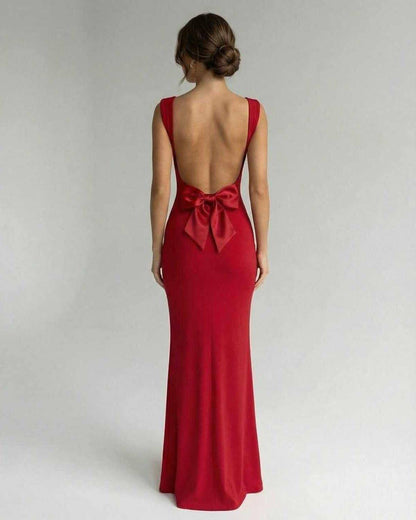 Toya Maxi Dress in vibrant red, backless design with bow detail, elegant for formal events by RAMBLION.