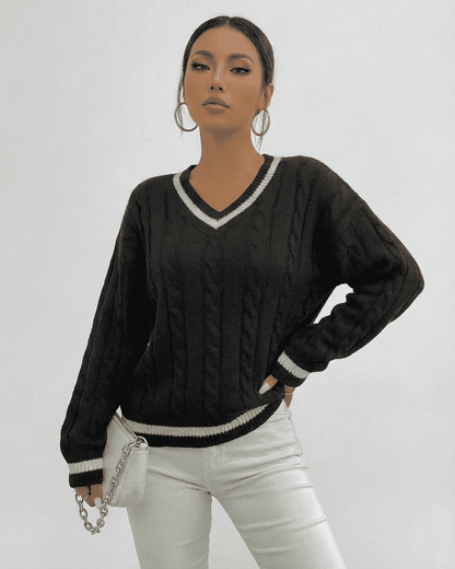 Verona Sweater by RAMBLION in black cable knit with V-neck and white trim, perfect for layering and everyday wear.