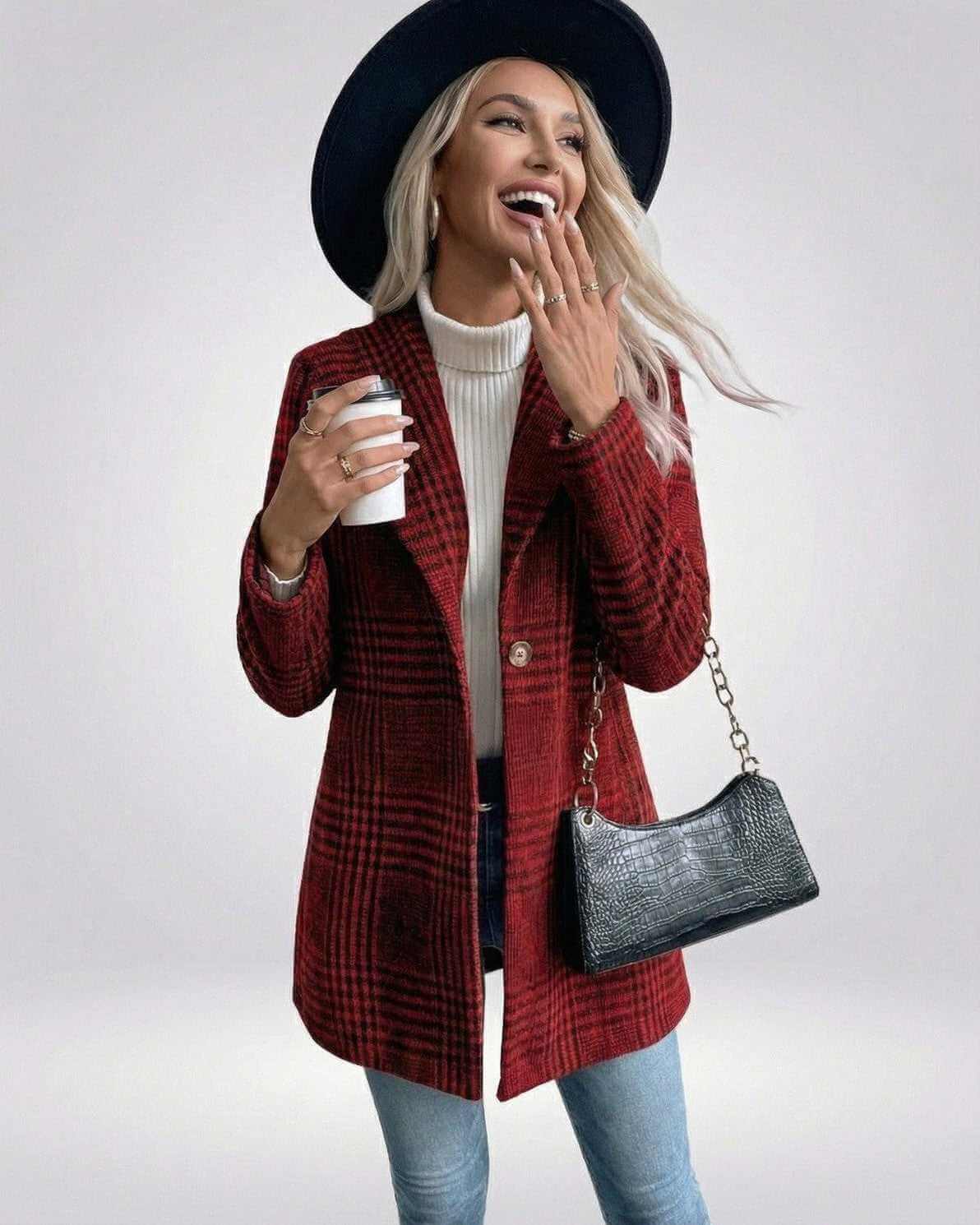 Verona Jacket – Women’s Red Plaid Jacket styled with a hat and purse, showcasing its slim fit and tailored design.