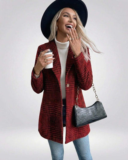 Verona Jacket – Women’s Red Plaid Jacket styled with a hat and purse, showcasing its slim fit and tailored design.