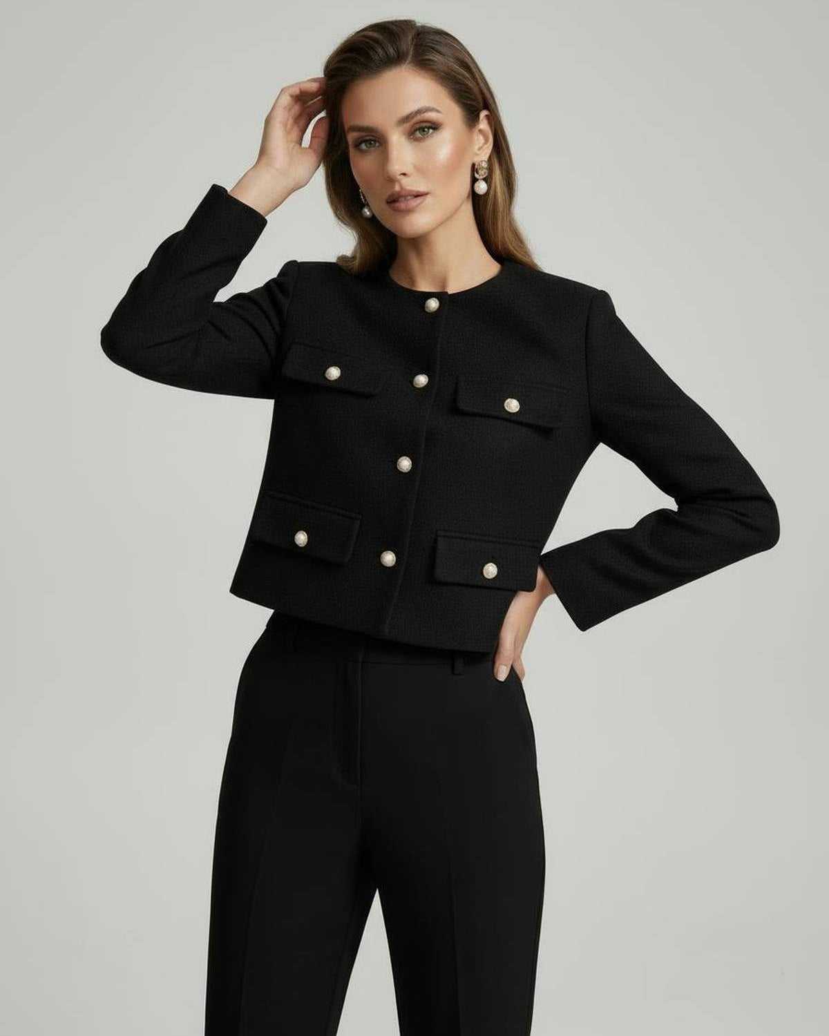 Yaia Jacket by RAMBLION, black cropped jacket with gold buttons, stylish and sophisticated, perfect for cooler occasions.