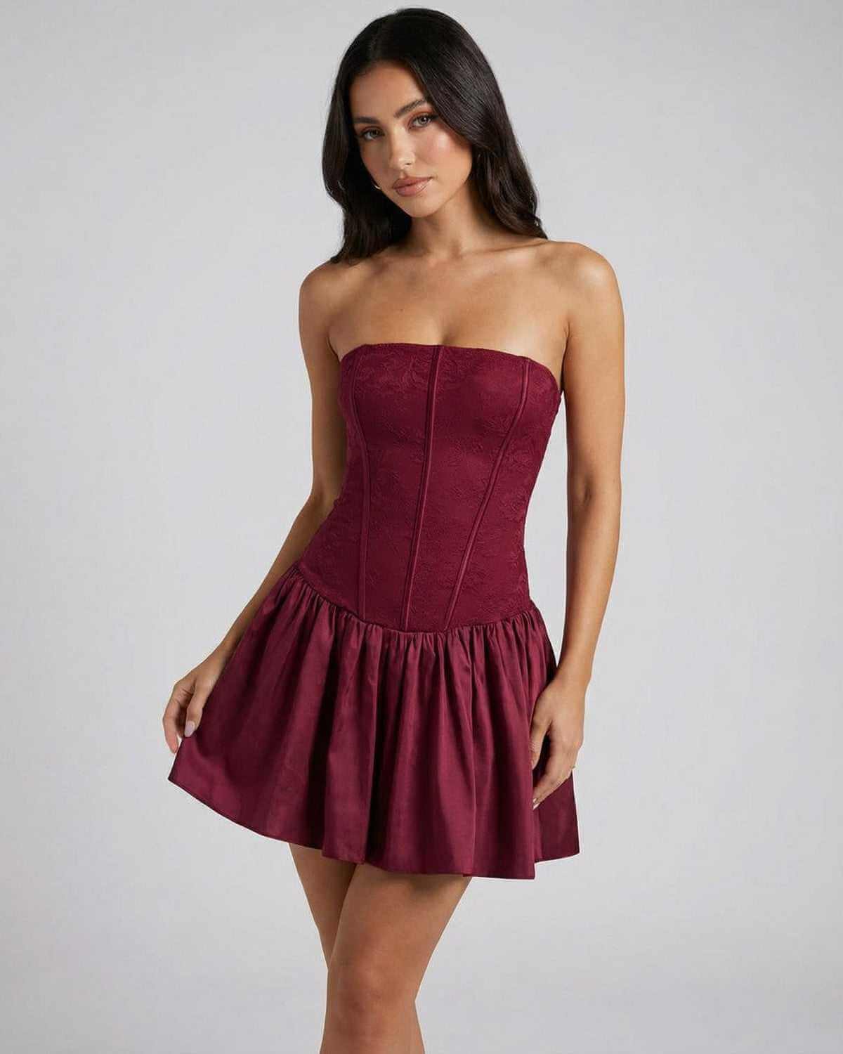 Rona Mini Dress in bold red hue, strapless design, flared skirt, perfect for special occasions by RAMBLION.
