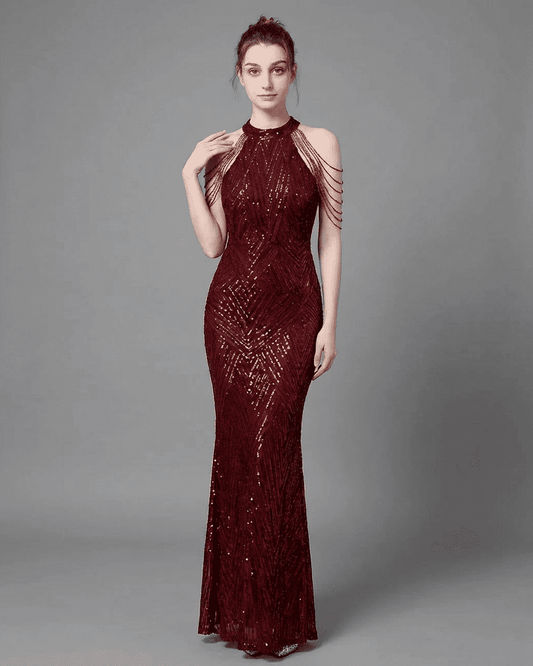 Ruby Maxi Dress - Glamorous sequin halter mermaid gown in deep red with elegant details.