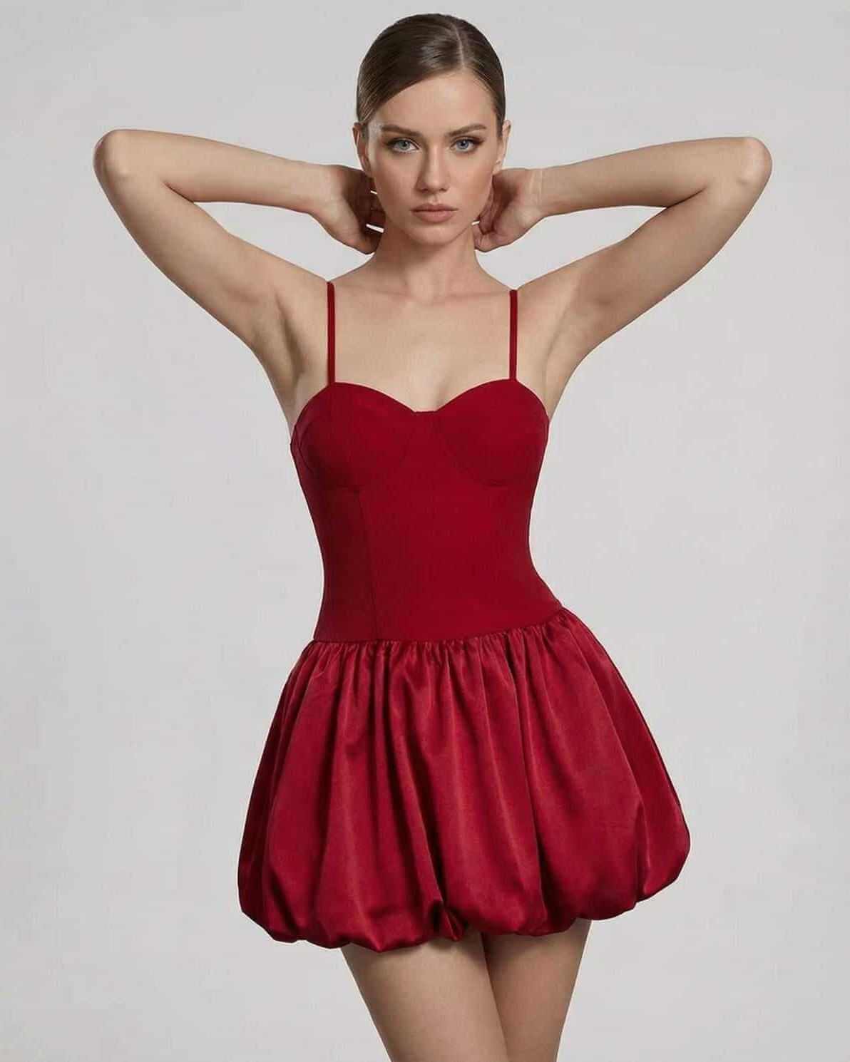 Carmine Mini Dress featuring a sculpted bodice and puff skirt silhouette, designed by RAMBLION.
