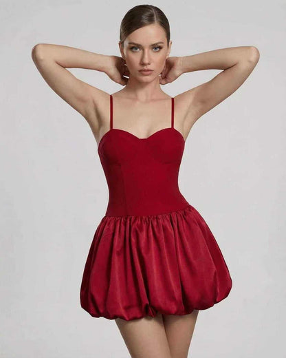 Carmine Mini Dress featuring a sculpted bodice and puff skirt silhouette, designed by RAMBLION.